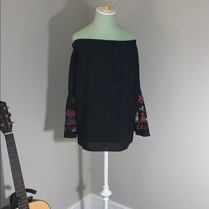 off-the-shoulder top with bell sleeve embroidery